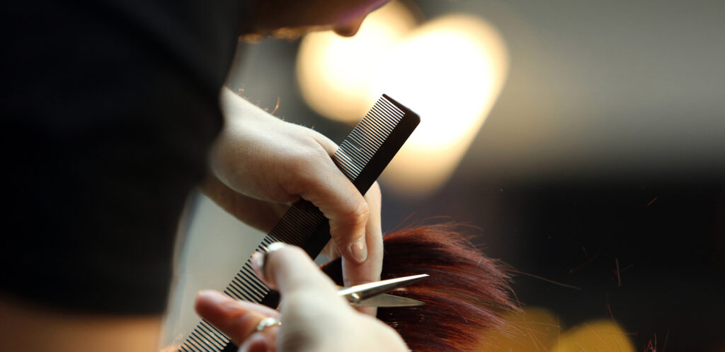 Barber cutting hair