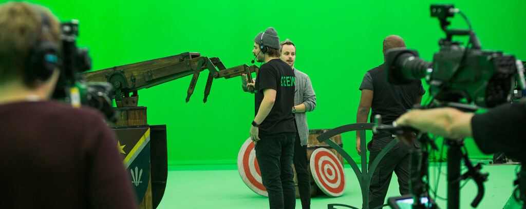 Pixotope Education Program Virtual Production Students stand in front of greenscreen