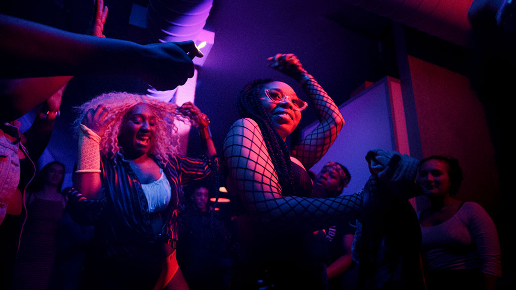 Bad Like Brooklyn Dancehall scene featuring a dancing hall woman, graded in DaVinci Resolve Studio