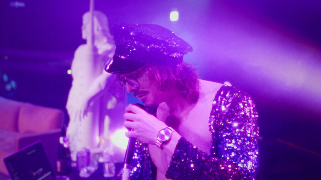 Musician Marc Rebillet singing on stage Image Source: Tribeca Film Festival