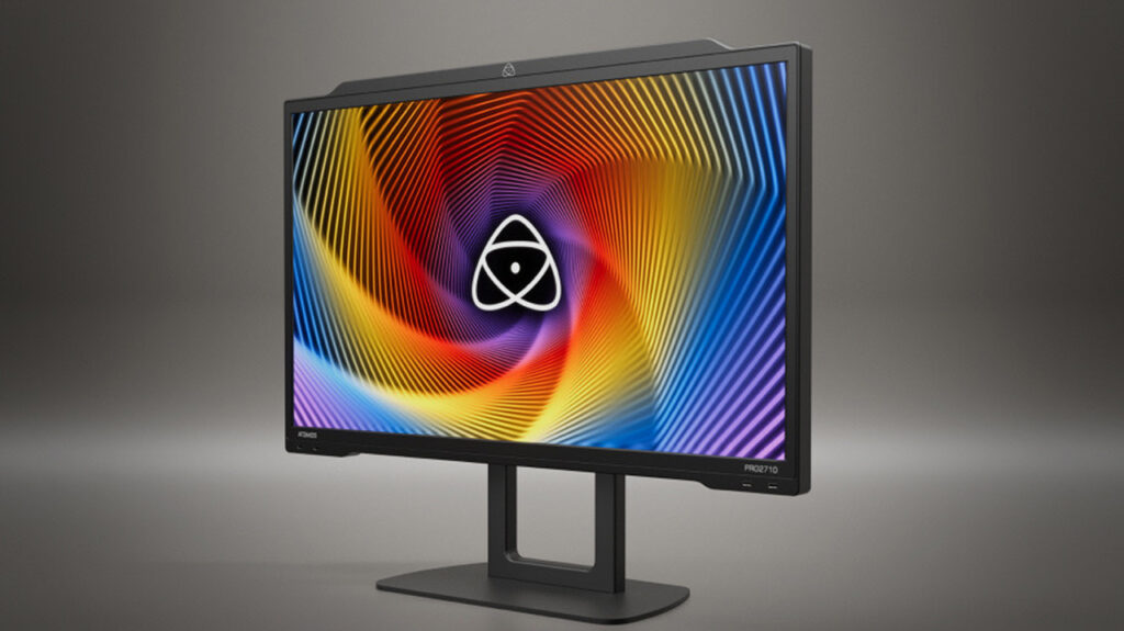 The Atomos Studio PRO 2710 reference monitor with a rainbow display on the screen
