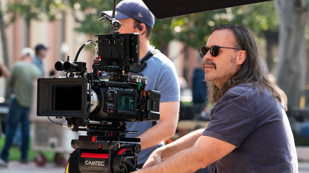 Cinematographer Black McClure sits near a Blackmagic URSA Cine camera