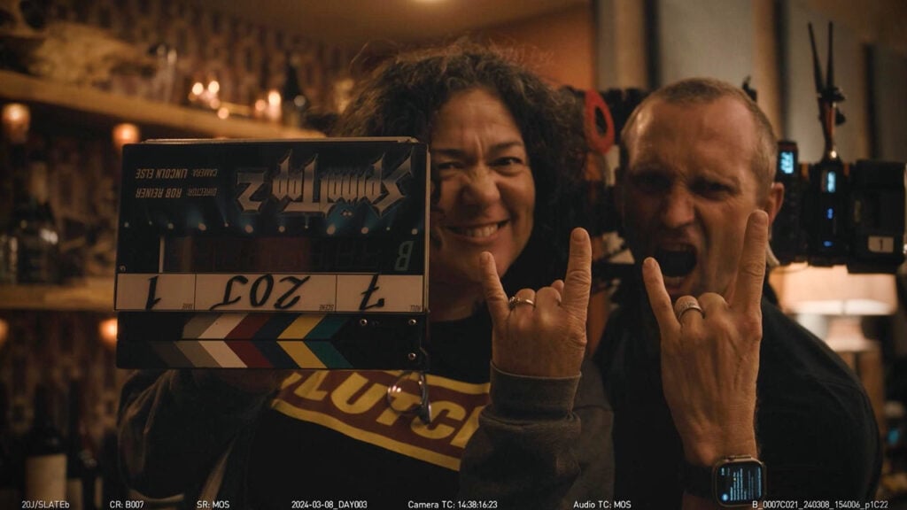 two members of the band Spinal Tap pose for a photo