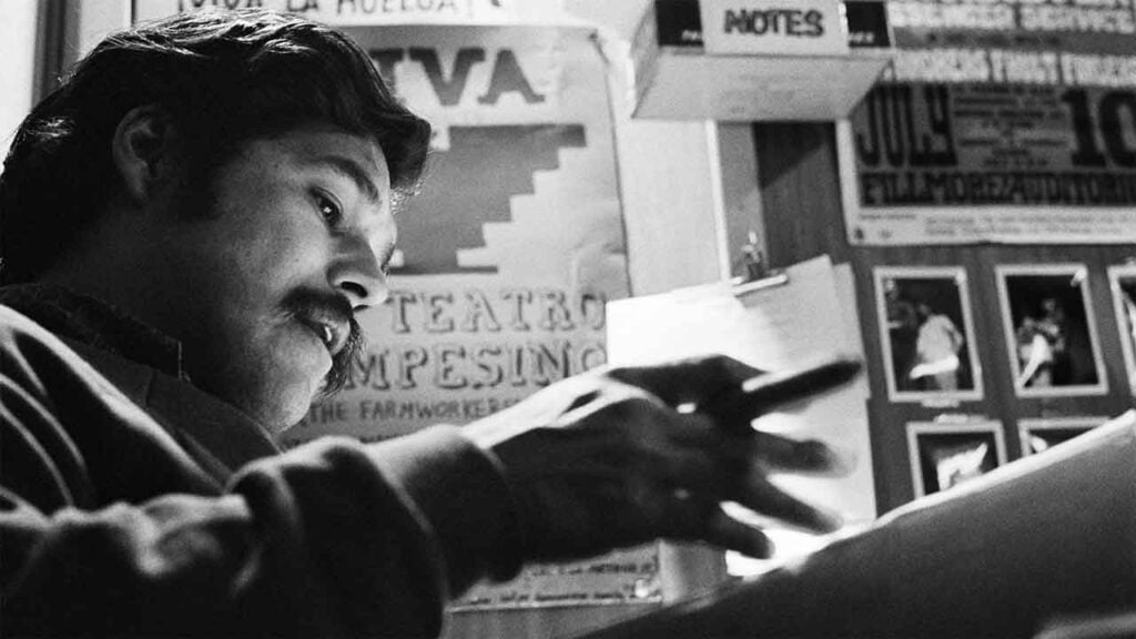 black and white picture of a man from the film American Pachuko