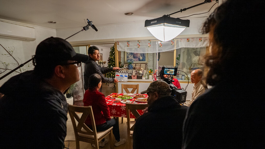 Ruowei Wang on set directing a production