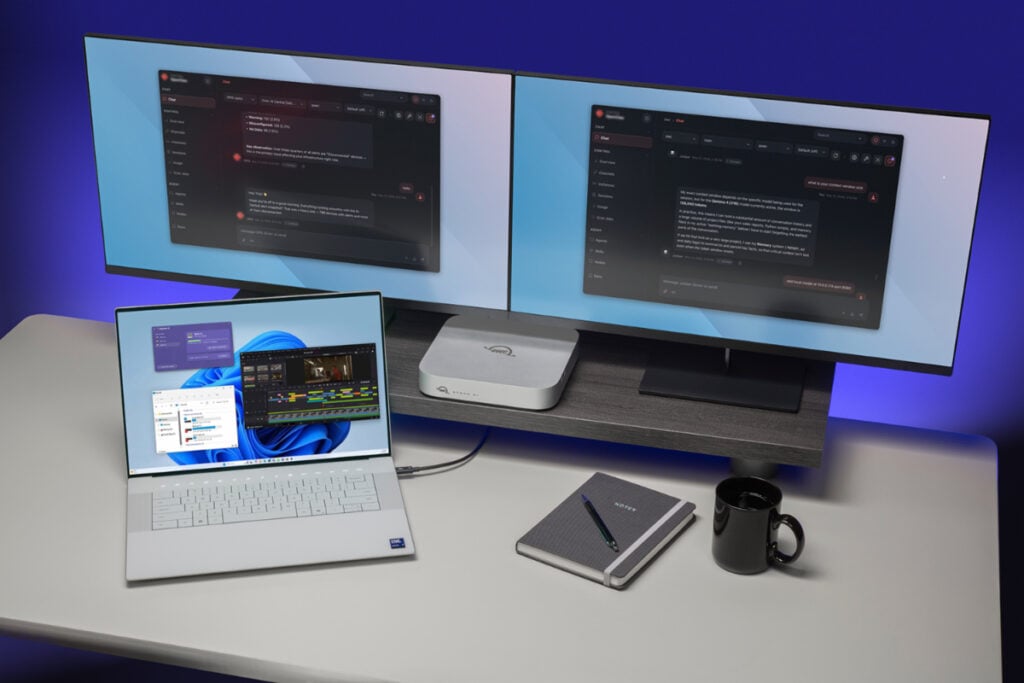 image of a computer with two monitors and an OWC device attached