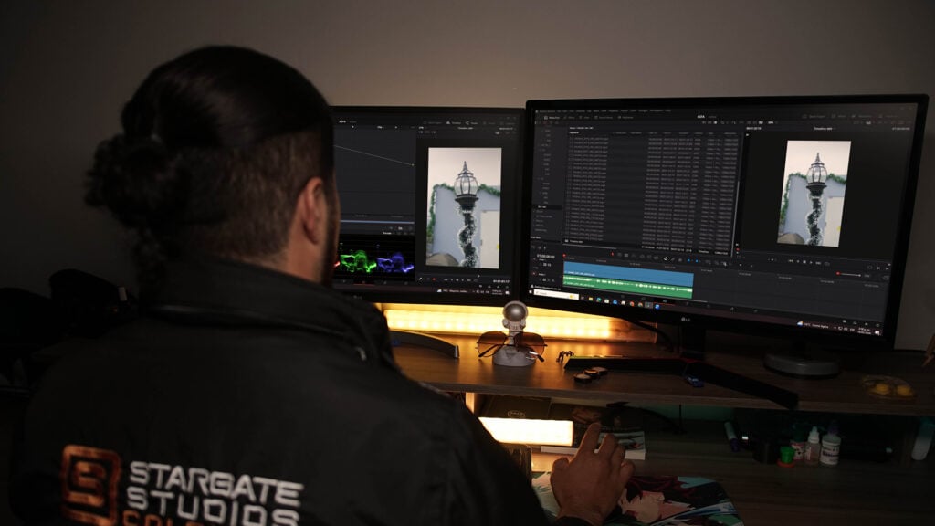 a man in Stargate Studios Colombia uses DaVinci Resolve on a computer to complete post-production tasks