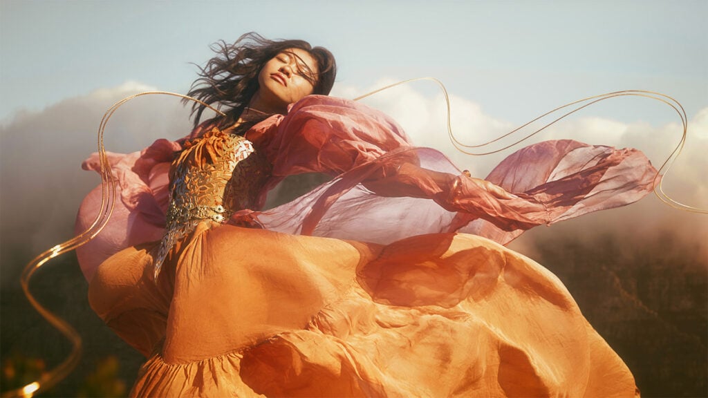 image of a woman in a golden dress that has been improved with Boris FX Plugin software