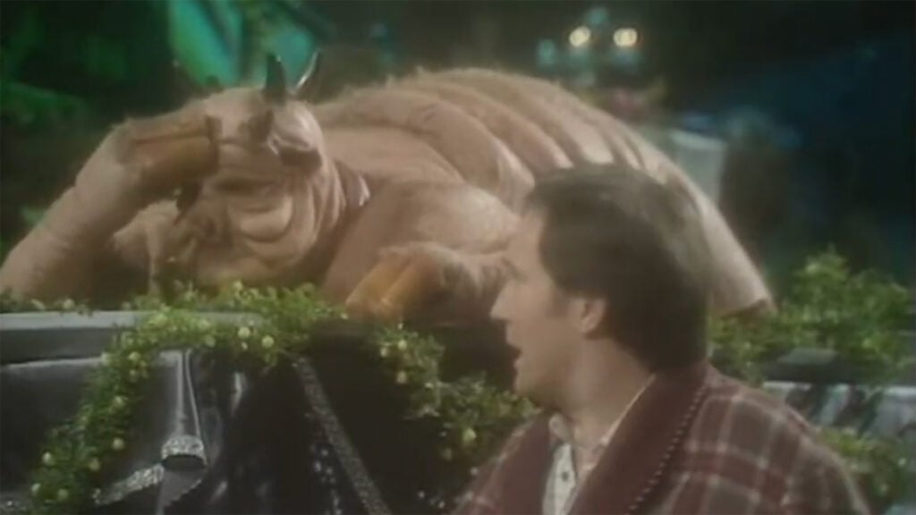 a scene from the film Hitchhiker's Guide to the Galaxy where Ameglian Major Cow insists on being eaten by Arthur Dent